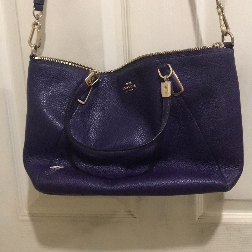 Coach purse! Has something on it.